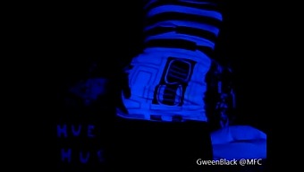 Provocative Dance Routine Under Dark Light With Emphasis On Buttocks