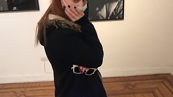 A Woman Uses A Vibrator In An Art Gallery For Self-Pleasure