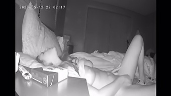 A Timid Woman Pleasures Herself With Her Fingers Before Bed, Caught On A Hidden Camera